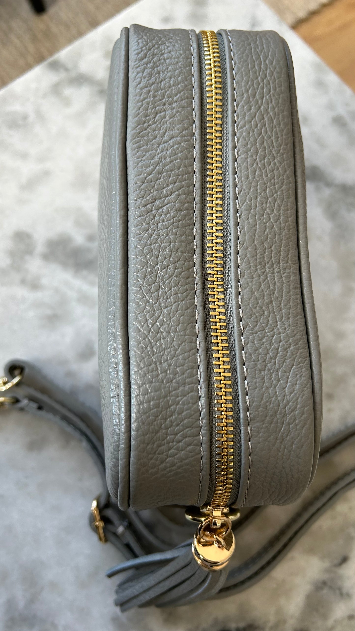 Tassel disco leather handbag in Grey