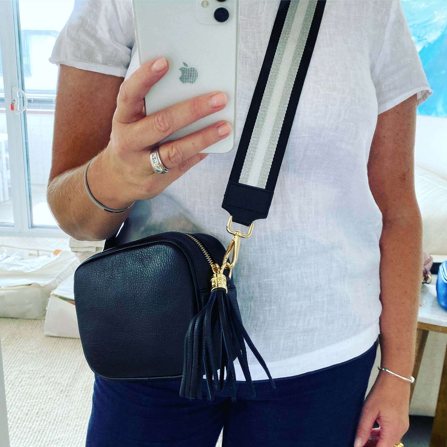 Tassel disco leather handbag in Black