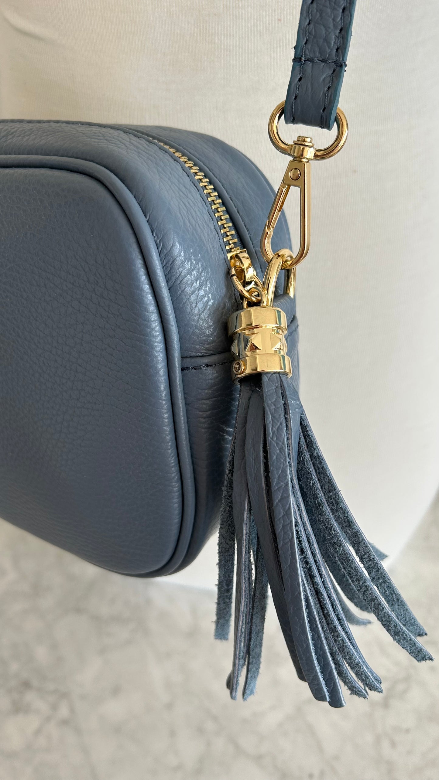 Tassel disco leather handbag in French Blue