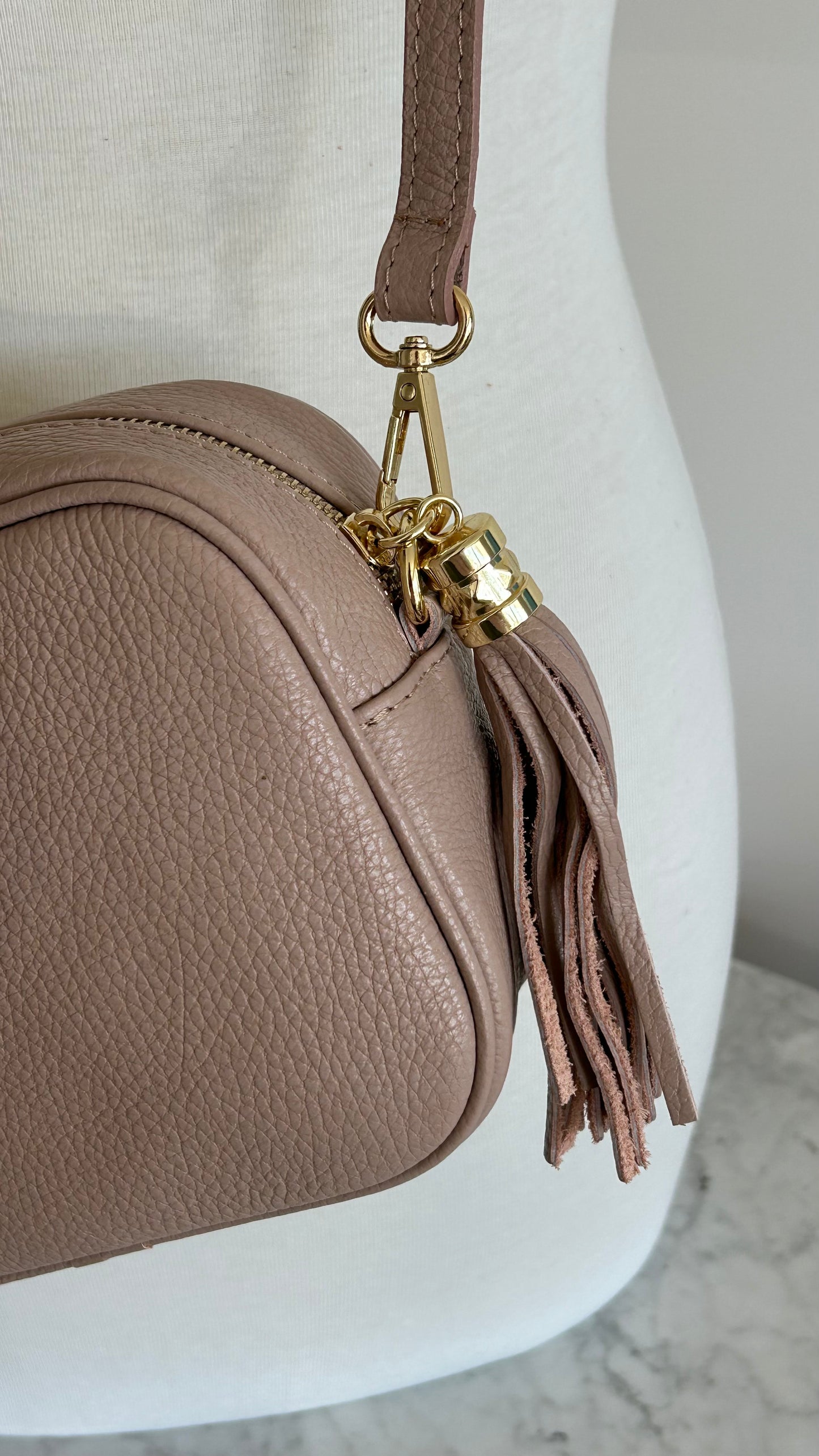 Tassel disco leather handbag in blush Pink
