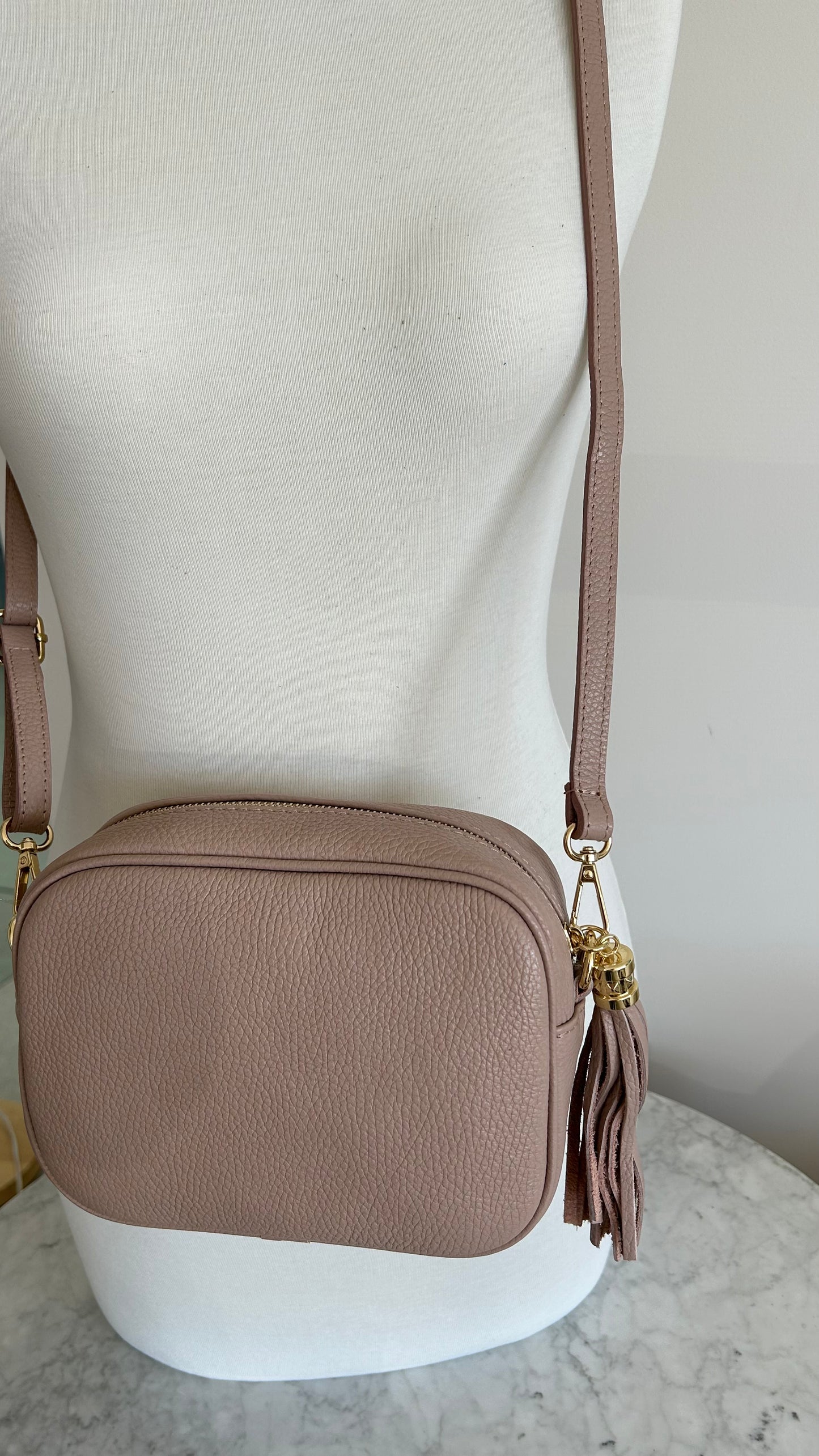 Tassel disco leather handbag in blush Pink
