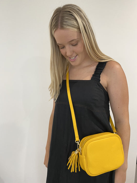 Tassel disco yellow leather handbag in Yellow